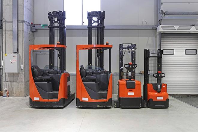 forklifts parked in a manufacturing facility